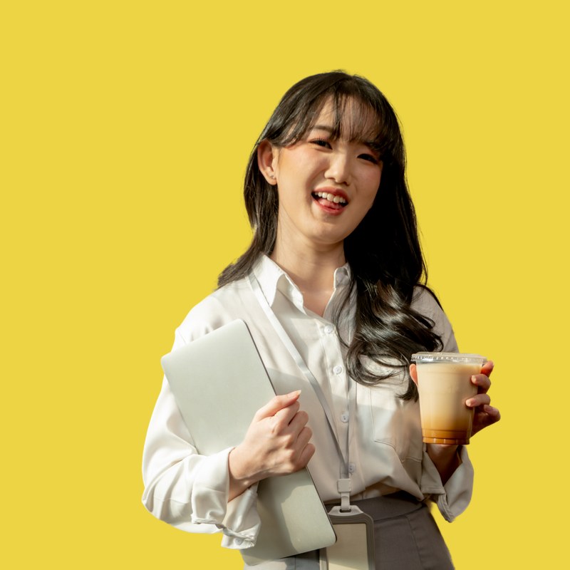 A practitioner in a cream blazer with a relaxed, editorial presence against a ripe lemon background
